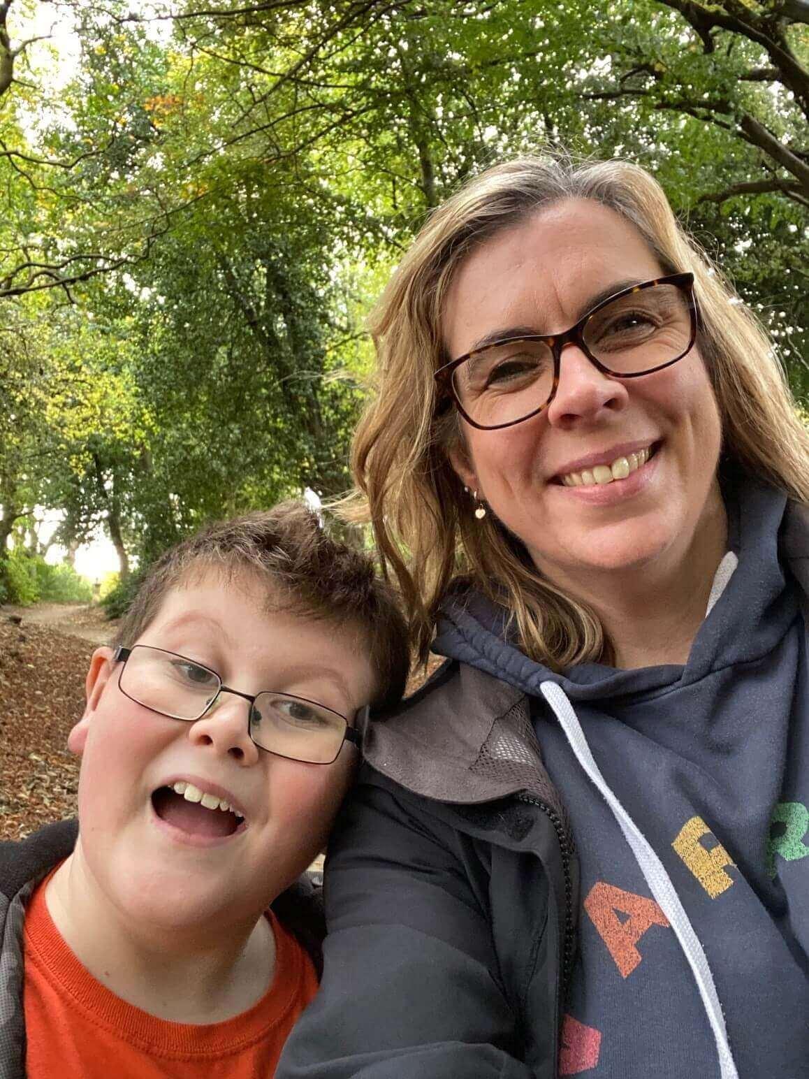 A  mother and son taking a selfie