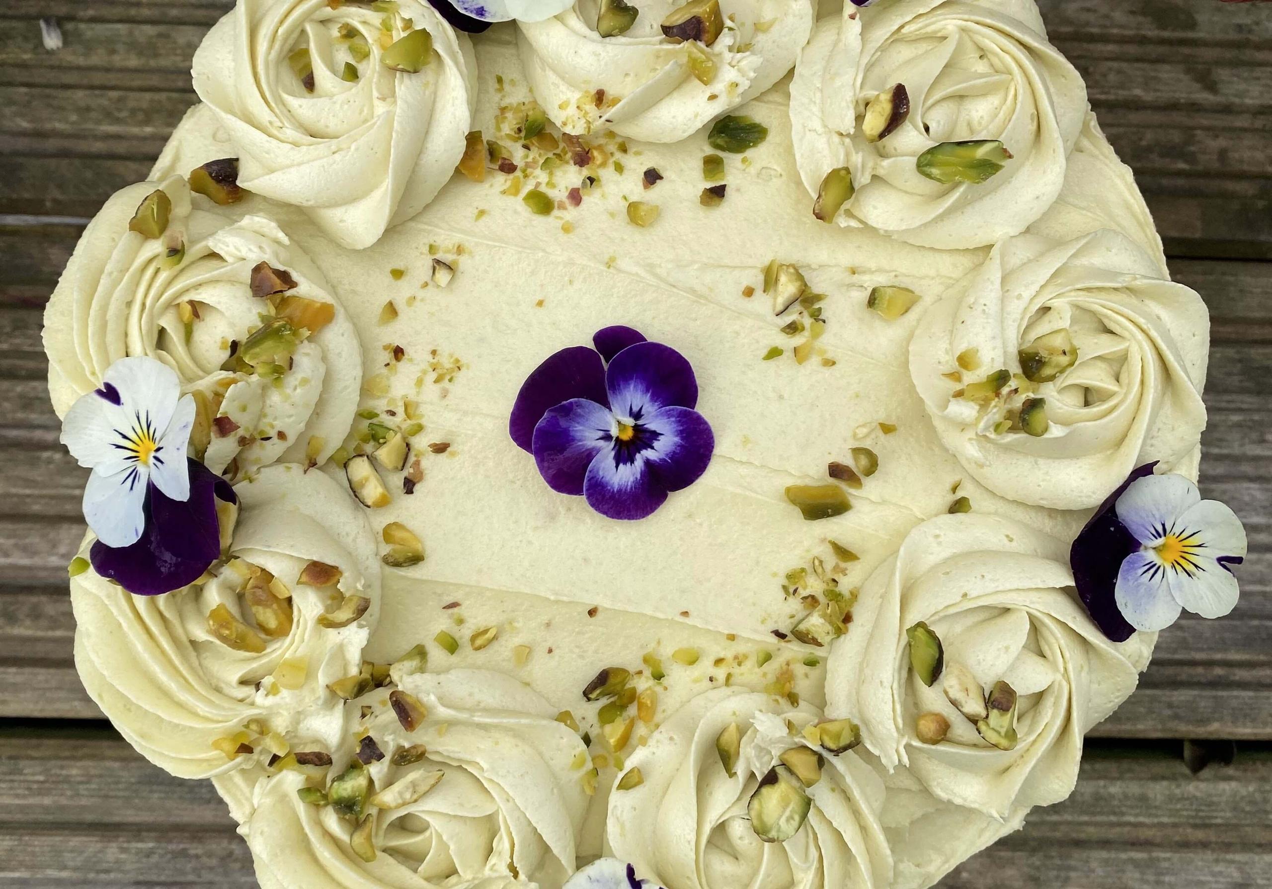 Celebration cake with purple flowers