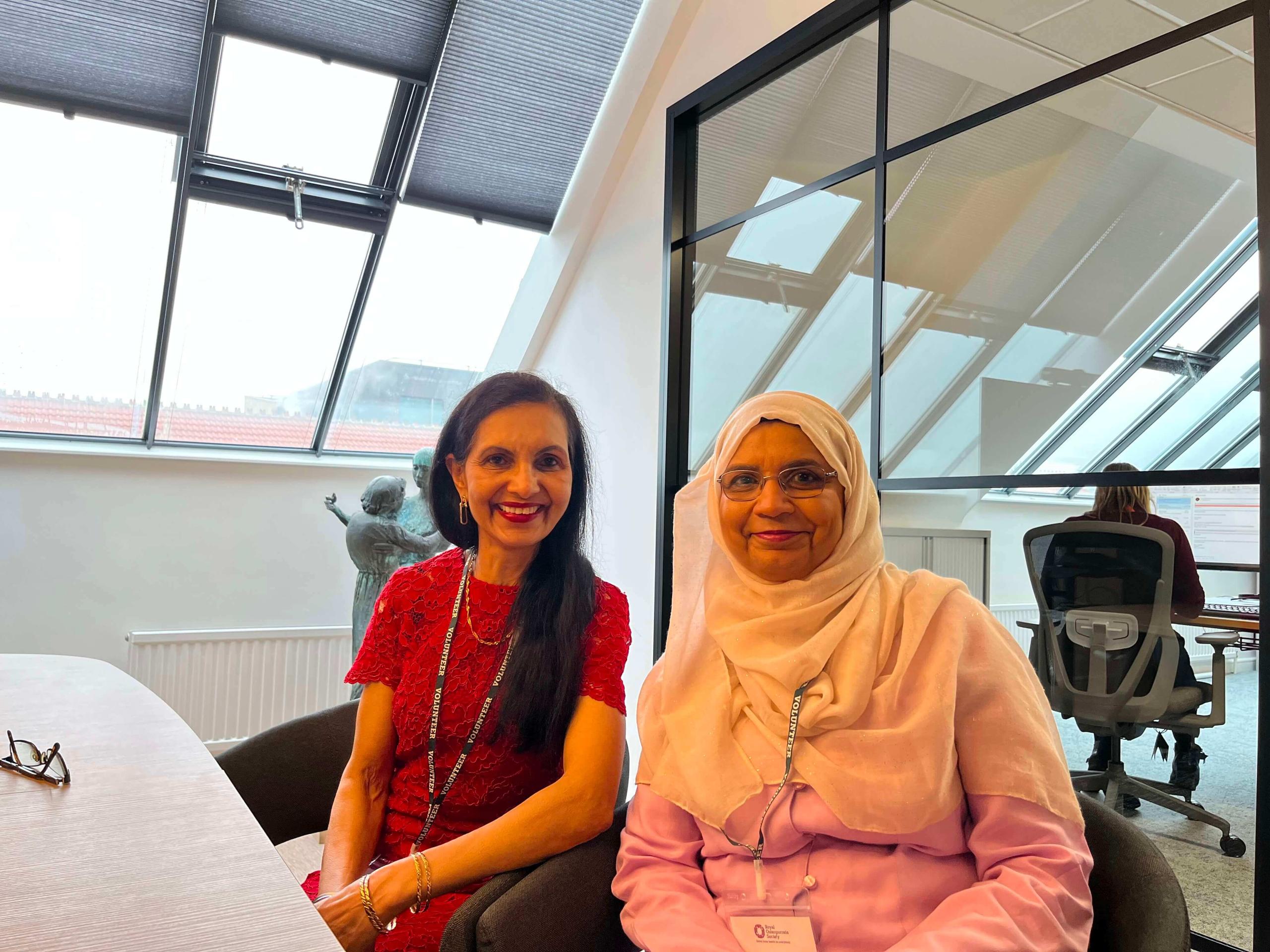 Two women sitting in an office