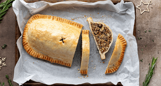 Beef wellington on a table, pictured from above