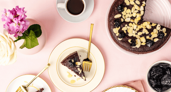 California Prune and almond cake on a plate shot from above