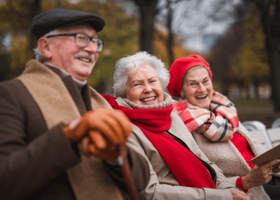 Group of old people on a bench