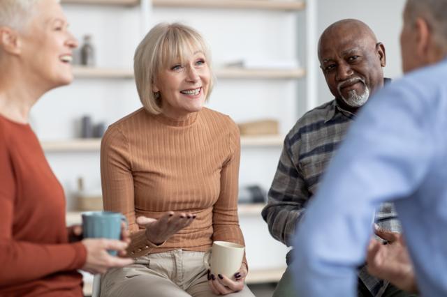 People chatting over tea and coffee
