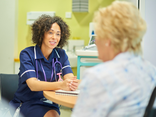 Nurse talking to a senior lady