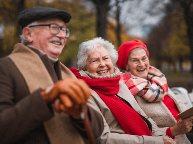 Group of old people on a bench