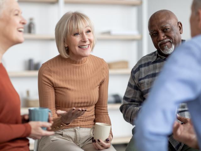 People chatting over tea and coffee